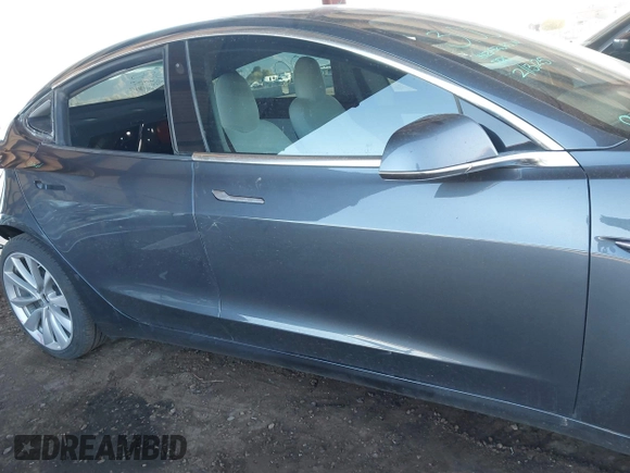 2018 Tesla Model 3 Long Range Battery with VIN 5YJ3E1EA3JF169132, listed as a IAAI auction lot 41678383 with 170,809 mi miles and . Bid and sale history available at DreamBid. Image 14.