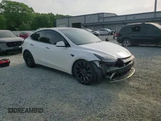 2021 Tesla Model Y Performance z VIN 5YJYGDEF0MF258819, wystawiony jako Copart lot #53944085 z przebiegiem 55 252 mil mil oraz Szkoda całkowita • Salvage title. Historia ofert i sprzedaży dostępna na DreamBid. Obrazek 13.