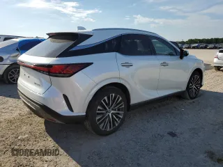 2023 Lexus RX with VIN JTJCHMAA5P2008692, listed as a Copart auction lot 66699123 with 3,217 mi miles. Bid and sale history available at carsss.com. Image 3.