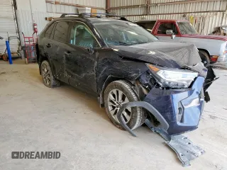 2021 Toyota RAV4 XLE Premium with VIN 2T3C1RFV7MC092468, listed as a Copart auction lot 59109315 with 98,552 mi miles and Salvage title. Bid and sale history available at DreamBid. Image 4.