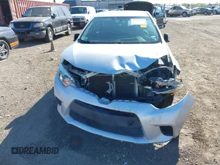 2016 Toyota Corolla L z VIN 5YFBURHE2GP459516, wystawiony jako IAAI lot #41750043 z przebiegiem 111 339 mil mil oraz . Historia ofert i sprzedaży dostępna na DreamBid. Obrazek 6.