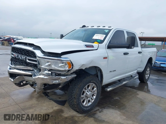 2020 Ram 2500 Tradesman z VIN 3C6UR5CJ4LG235002, wystawiony jako IAAI lot #42117169 z przebiegiem 170 299 mil mil oraz . Historia ofert i sprzedaży dostępna na DreamBid. Obrazek 2.