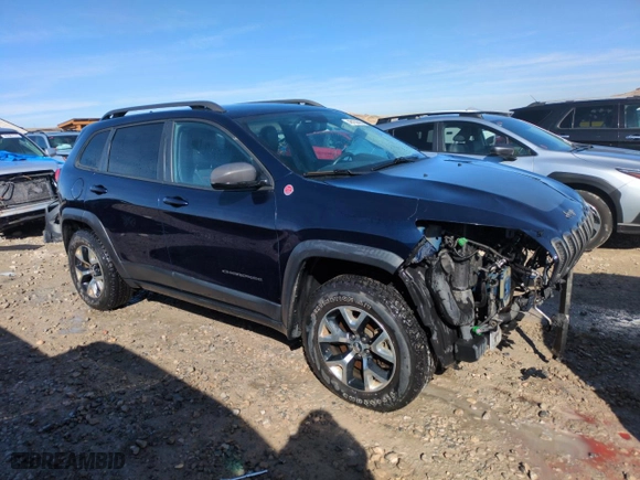 2015 Jeep Cherokee Trailhawk with VIN 1C4PJMBS6FW778665, listed as a Copart auction lot 48158035 with 107,638 mi miles and Salvage Title. Bid and sale history available at carsss.com. Image 4.