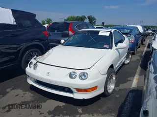 1997 Acura Integra GS-R with VIN JH4DC2392YS006704, listed as a IAAI auction lot 39813561 with 113,096 mi miles. Bid and sale history available at carsss.com. Image 2.