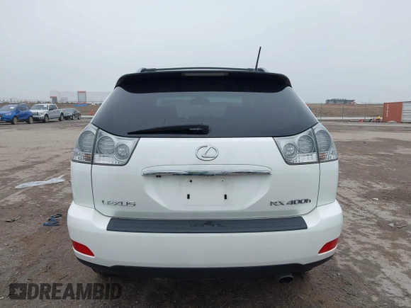 2007 Lexus RX 400h z VIN JTJGW31U572003651, wystawiony jako IAAI lot #42163515 z przebiegiem 358 648 mil mil oraz . Historia ofert i sprzedaży dostępna na DreamBid. Obrazek 16.