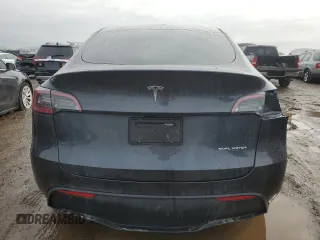2024 Tesla Model Y Long Range with VIN 7SAYGAEE7RF043096, listed as a Copart auction lot 46939395 with 12,521 mi miles and Salvage Title. Bid and sale history available at DreamBid. Image 6.