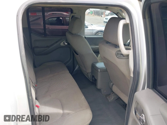 2007 Nissan Frontier LE with VIN 1N6AD07W17C438647, listed as a IAAI auction lot 40502289 with 153,553 mi miles and . Bid and sale history available at DreamBid. Image 8.