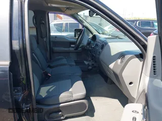 2007 Ford F-150 XLT with VIN 1FTPW14V67KC70678, listed as a IAAI auction lot 42002237 with 309,291 mi miles. Bid and sale history available at carsss.com. Image 5.