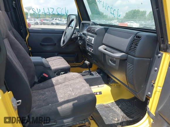 2004 Jeep Wrangler Sport z VIN 1J4FA49S04P701986, wystawiony jako IAAI lot #42256648 z przebiegiem 129 946 mil mil oraz . Historia ofert i sprzedaży dostępna na DreamBid. Obrazek 5.