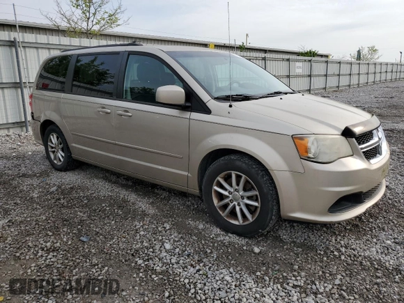 2014 Dodge Grand Caravan SXT z VIN 2C4RDGCG1ER214411, wystawiony jako Copart lot #55497065 z przebiegiem 176 662 mil mil oraz Czysty tytuł • Clean title. Historia ofert i sprzedaży dostępna na DreamBid. Obrazek 4.