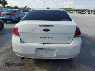 2010 Ford Focus SE with VIN 1FAHP3FN1AW168723, listed as a Copart auction lot 53871655 with 226,703 mi miles and Salvage Title. Bid and sale history available at DreamBid. Image 6.