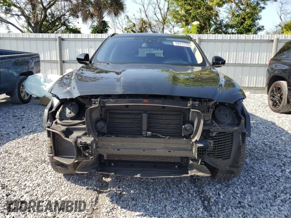 2018 Jaguar F-Pace 25t Premium with VIN SADCJ2FX6JA299858, listed as a Copart auction lot 59212765 with 74,971 mi miles and Salvage title. Bid and sale history available at DreamBid. Image 5.