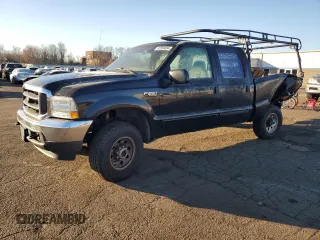 2003 Ford Super Duty F-250 XL with VIN 1FTNW21L33EC29045, listed as a Copart auction lot 82598394 with 212,758 mi miles and Salvage Title. Bid and sale history available at carsss.com. Image 1.