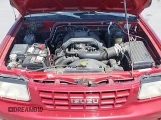 1999 Isuzu Rodeo S z VIN 4S2CK58WXX4346156, wystawiony jako IAAI lot #42328951 z przebiegiem 196 182 mil mil oraz . Historia ofert i sprzedaży dostępna na DreamBid. Obrazek 10.