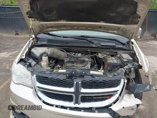 2013 Dodge Grand Caravan Crew with VIN 2C4RDGDG7DR624563, listed as a IAAI auction lot 42038157 with 265,044 mi miles and . Bid and sale history available at DreamBid. Image 10.