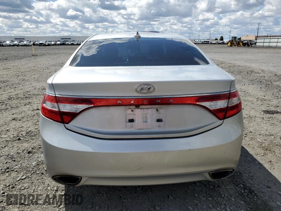 2013 Hyundai Azera z VIN KMHFG4JG7DA218926, wystawiony jako Copart lot #57419495 z przebiegiem 90 968 mil mil oraz Szkoda całkowita • Salvage title. Historia ofert i sprzedaży dostępna na DreamBid. Obrazek 6.
