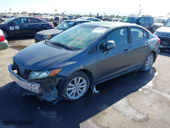 2012 Honda Civic Sdn EX with VIN 2HGFB2F85CH302933, listed as a IAAI auction lot 40946979 with 60,762 mi miles. Bid and sale history available at carsss.com. Image 2.
