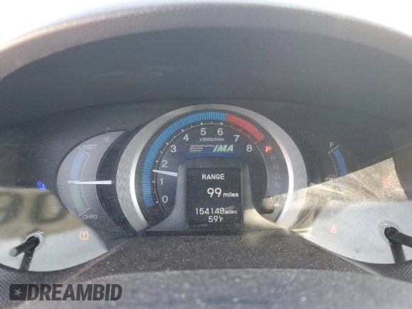 2010 Honda Insight EX z VIN JHMZE2H74AS034758, wystawiony jako Copart lot #52905445 z przebiegiem 154 148 mil mil oraz Szkoda całkowita • Salvage title. Historia ofert i sprzedaży dostępna na DreamBid. Obrazek 9.