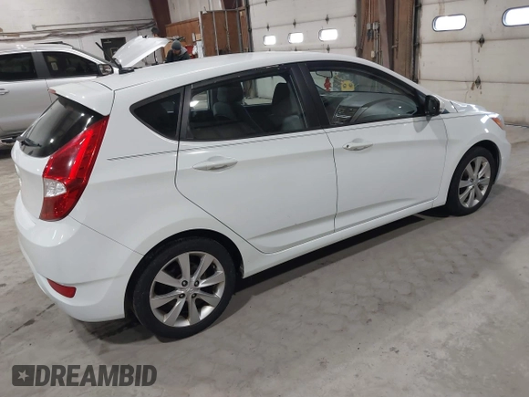 2014 Hyundai Accent SE z VIN KMHCU5AE4EU163402, wystawiony jako IAAI lot #41755872 z przebiegiem 161 017 mil mil oraz . Historia ofert i sprzedaży dostępna na DreamBid. Obrazek 4.
