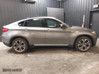 2014 BMW X6 50i with VIN 5UXFG8C55EL592995, listed as a IAAI auction lot 41724960 with 137,112 mi miles. Bid and sale history available at carsss.com. Image 14.