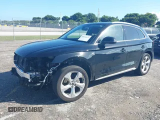 2023 Audi Q5 S line Premium Plus z VIN WA1EAAFY5P2128250, wystawiony jako IAAI lot #40666613 z przebiegiem 27 940 mil mil oraz . Historia ofert i sprzedaży dostępna na DreamBid. Obrazek 2.