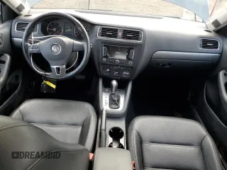 2014 Volkswagen Jetta TDI w/Premium with VIN 3VWLL7AJ6EM428743, listed as a Copart auction lot 63459355 with 145,814 mi miles and Salvage title. Bid and sale history available at DreamBid. Image 8.