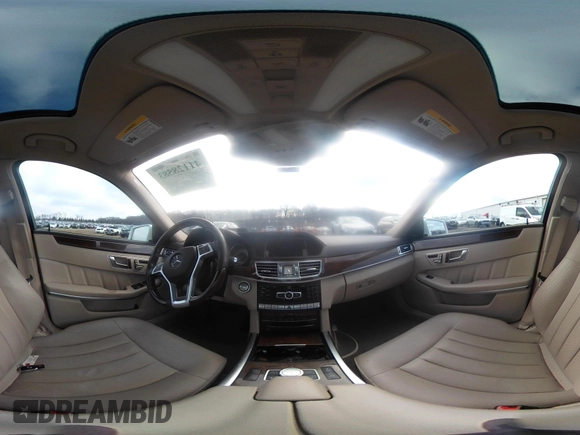 2014 Mercedes-Benz E 550 Sport with VIN WDDHF9BB5EA949457, listed as a IAAI auction lot 41128583 with 99,248 mi miles and . Bid and sale history available at DreamBid. Image 18.