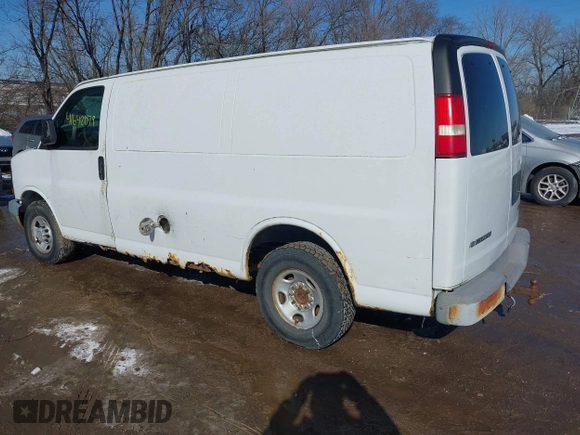 2007 Chevrolet Express Cargo Van with VIN 1GCGG25VX71126543, listed as a IAAI auction lot 41642079 with 97,859 mi miles. Bid and sale history available at carsss.com. Image 3.