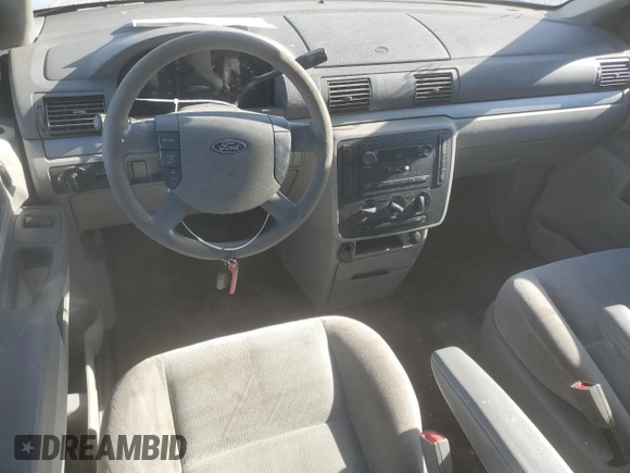 2007 Ford Freestar Cargo z VIN 2FTZA546X7BA14996, wystawiony jako Copart lot #76115294 z przebiegiem 107 450 mil mil oraz Szkody całkowita. Historia ofert i sprzedaży dostępna na DreamBid. Obrazek 8.