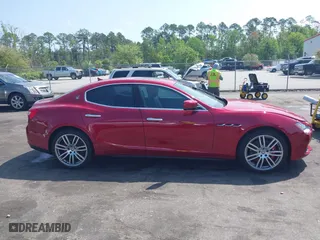 2015 Maserati Ghibli with VIN ZAM57XSA5F1129883, listed as a IAAI auction lot 41920750 with 63,739 mi miles. Bid and sale history available at carsss.com. Image 13.