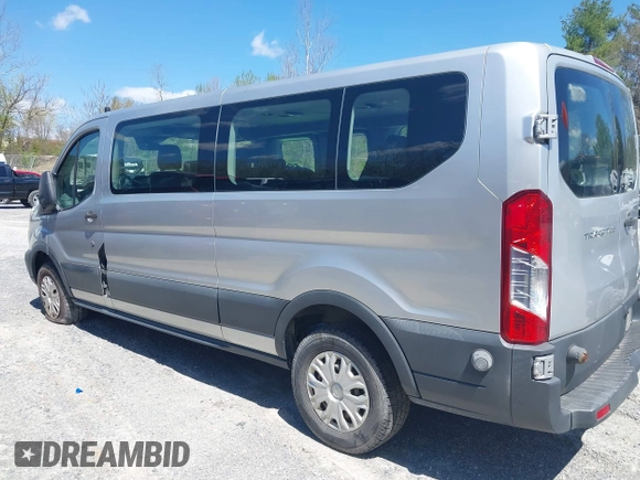 2016 Ford Transit Wagon XL with VIN 1FBZX2ZM8GKA69218, listed as a IAAI auction lot 42027106 with 311,419 mi miles. Bid and sale history available at carsss.com. Image 3.