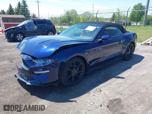 2020 Ford Mustang EcoBoost with VIN 1FATP8UH2L5127689, listed as a IAAI auction lot 42219307 with 21,399 mi miles and . Bid and sale history available at DreamBid. Image 2.