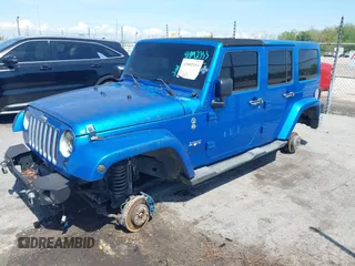 2016 Jeep Wrangler Unlimited Sahara with VIN 1C4HJWEG0GL154418, listed as a IAAI auction lot 41892333 with 102,410 mi miles and . Bid and sale history available at DreamBid. Image 14.