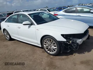 2012 Audi A6 3.0T Premium Plus with VIN WAUBGAFC5CN006070, listed as a IAAI auction lot 41912258 with 68,812 mi miles. Bid and sale history available at carsss.com. Image 1.