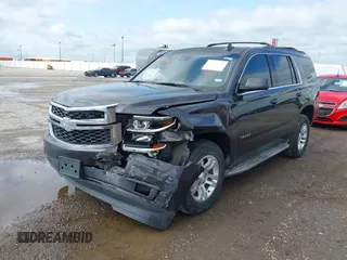 2015 Chevrolet Tahoe LT with VIN 1GNSCBKC2FR632173, listed as a IAAI auction lot 42135105 with 150,033 mi miles and . Bid and sale history available at DreamBid. Image 17.