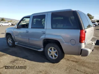 2000 GMC Denali z VIN 1GKEK63R8YR212220, wystawiony jako Copart lot #77606364 z przebiegiem 337 467 mil mil oraz Tytuł czysty. Historia ofert i sprzedaży dostępna na DreamBid. Obrazek 2.