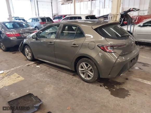 2019 Toyota Corolla Hatchback SE with VIN JTNK4RBE1K3011063, listed as a IAAI auction lot 41656864 with 104,102 mi miles. Bid and sale history available at carsss.com. Image 3.