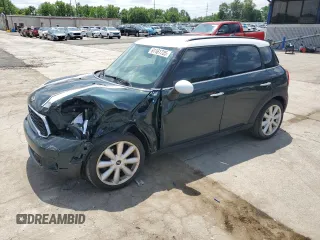 2013 MINI Countryman S with VIN WMWZC3C58DWP21965, listed as a Copart auction lot 61161735 with 142,797 mi miles and Salvage title. Bid and sale history available at DreamBid. Image 1.