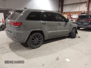 2019 Jeep Grand Cherokee Laredo E with VIN 1C4RJFAG9KC667394, listed as a IAAI auction lot 41316264 with 55,156 mi miles. Bid and sale history available at carsss.com. Image 4.
