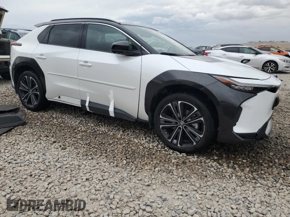 2023 Toyota bZ4X XLE with VIN JTMABACA9PA023807, listed as a Copart auction lot 48792805 with 10,397 mi miles and Salvage title. Bid and sale history available at DreamBid. Image 4.