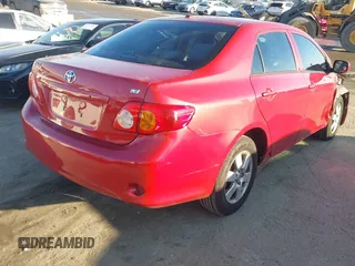 2009 Toyota Corolla with VIN 1NXBU40E19Z091295, listed as a IAAI auction lot 41645545 with 117,839 mi miles. Bid and sale history available at carsss.com. Image 4.