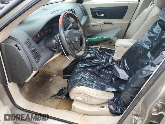 2004 Cadillac SRX with VIN 1GYDE63A640138815, listed as a Copart auction lot 76993364 with 0 mi miles and Salvage Title. Bid and sale history available at carsss.com. Image 7.