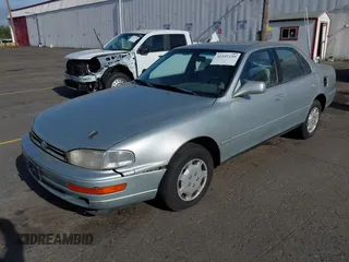 1994 Toyota Camry LE z VIN JT2SK12E0R0209312, wystawiony jako IAAI lot #42197159 z przebiegiem 270 657 mil mil oraz . Historia ofert i sprzedaży dostępna na DreamBid. Obrazek 2.