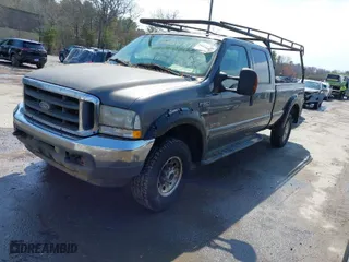 2003 Ford Super Duty F-350 SRW XL with VIN 1FTSW31P23EC92360, listed as a IAAI auction lot 42042773 with 299,010 mi miles. Bid and sale history available at carsss.com. Image 2.