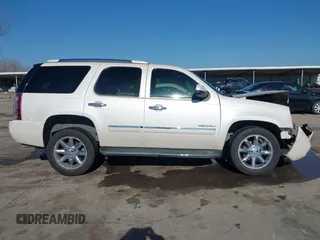 2013 GMC Yukon Denali with VIN 1GKS1EEF3DR357632, listed as a IAAI auction lot 41488295 with 187,635 mi miles. Bid and sale history available at carsss.com. Image 14.