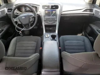 2020 Ford Fusion SE z VIN 3FA6P0LUXLR254247, wystawiony jako Copart lot #60658095 z przebiegiem 76 413 mil mil oraz Szkoda całkowita • Salvage title. Historia ofert i sprzedaży dostępna na DreamBid. Obrazek 8.