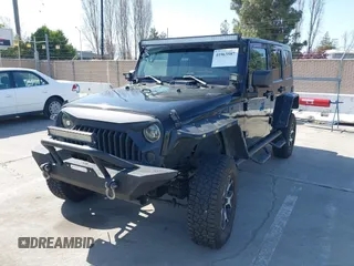 2008 Jeep Wrangler Unlimited Sahara with VIN 1J8GA59168L587554, listed as a IAAI auction lot 41963587 with 189,943 mi miles and . Bid and sale history available at DreamBid. Image 6.