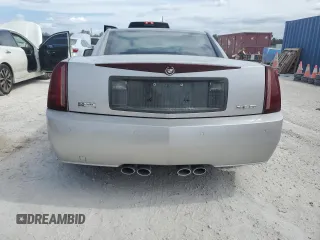 2004 Cadillac XLR z VIN 1G6YV34A945601007, wystawiony jako Copart lot #77077394 z przebiegiem Nie podano mil oraz Szkody całkowita. Historia ofert i sprzedaży dostępna na DreamBid. Obrazek 6.