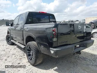 2009 Nissan Titan LE with VIN 1N6BA07D79N317253, listed as a IAAI auction lot 41944642 with 231,896 mi miles. Bid and sale history available at carsss.com. Image 3.