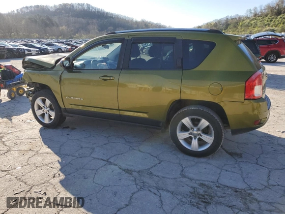 2012 Jeep Compass Latitude with VIN 1C4NJDEB6CD630669, listed as a Copart auction lot 52028235 with 124,123 mi miles and Salvage Title. Bid and sale history available at DreamBid. Image 2.